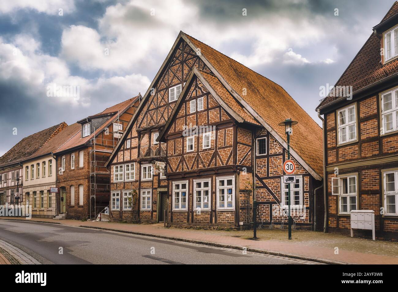 Old half-timbered houses on the main street Stock Photo