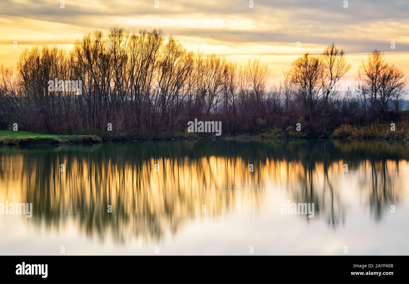 Sunset on the lakeside in burgenland Stock Photo