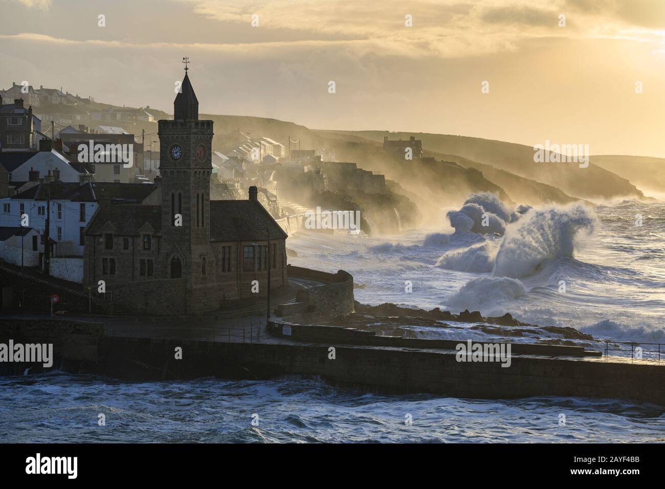 The clock tower at Porthleven captured on a stormy morning. Stock Photo