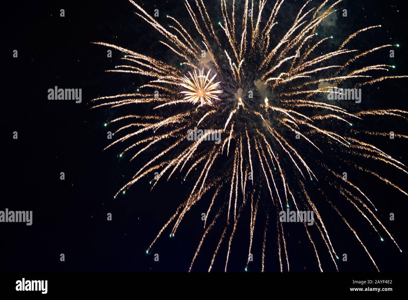 Frework lights over dark background Stock Photo