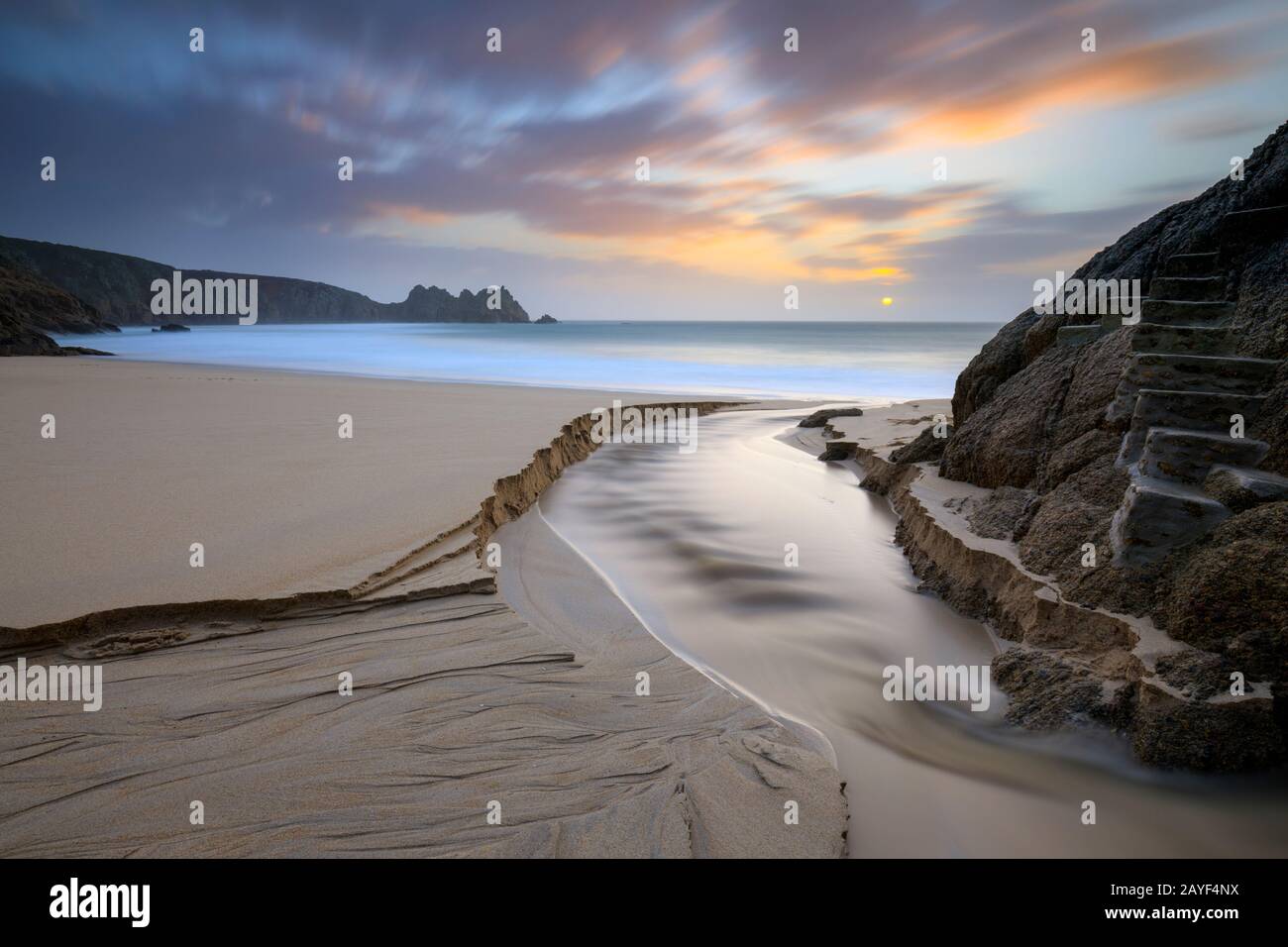 Porthcurno Beach in West Cornwall captured at sunrise. Stock Photo
