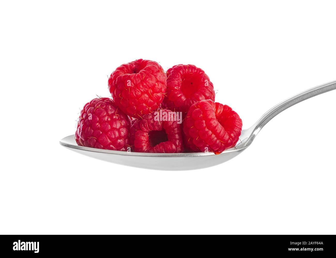 Spoon with raspberry Stock Photo - Alamy