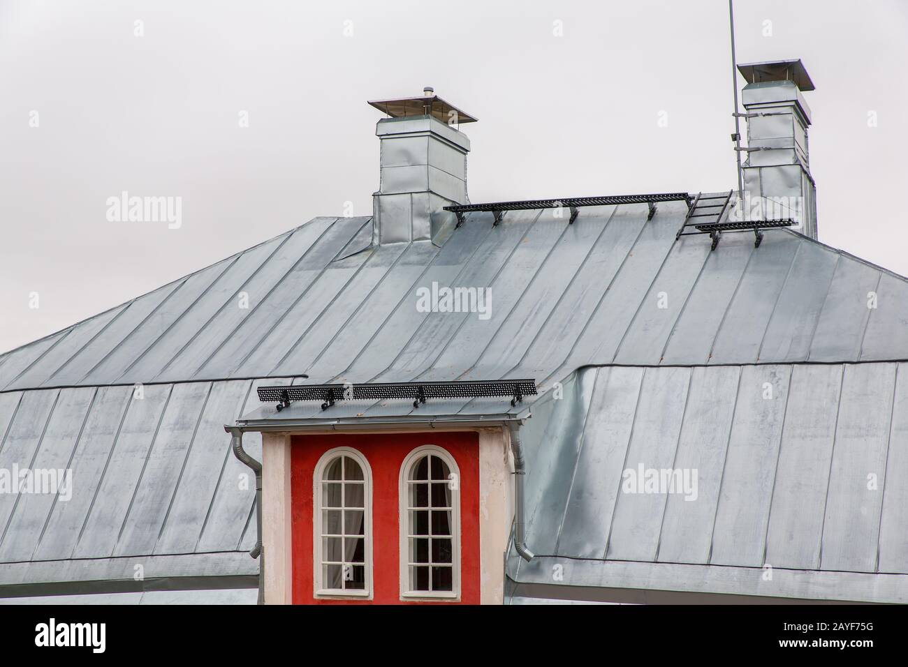 Metal zinc roofing on house in Finland Stock Photo