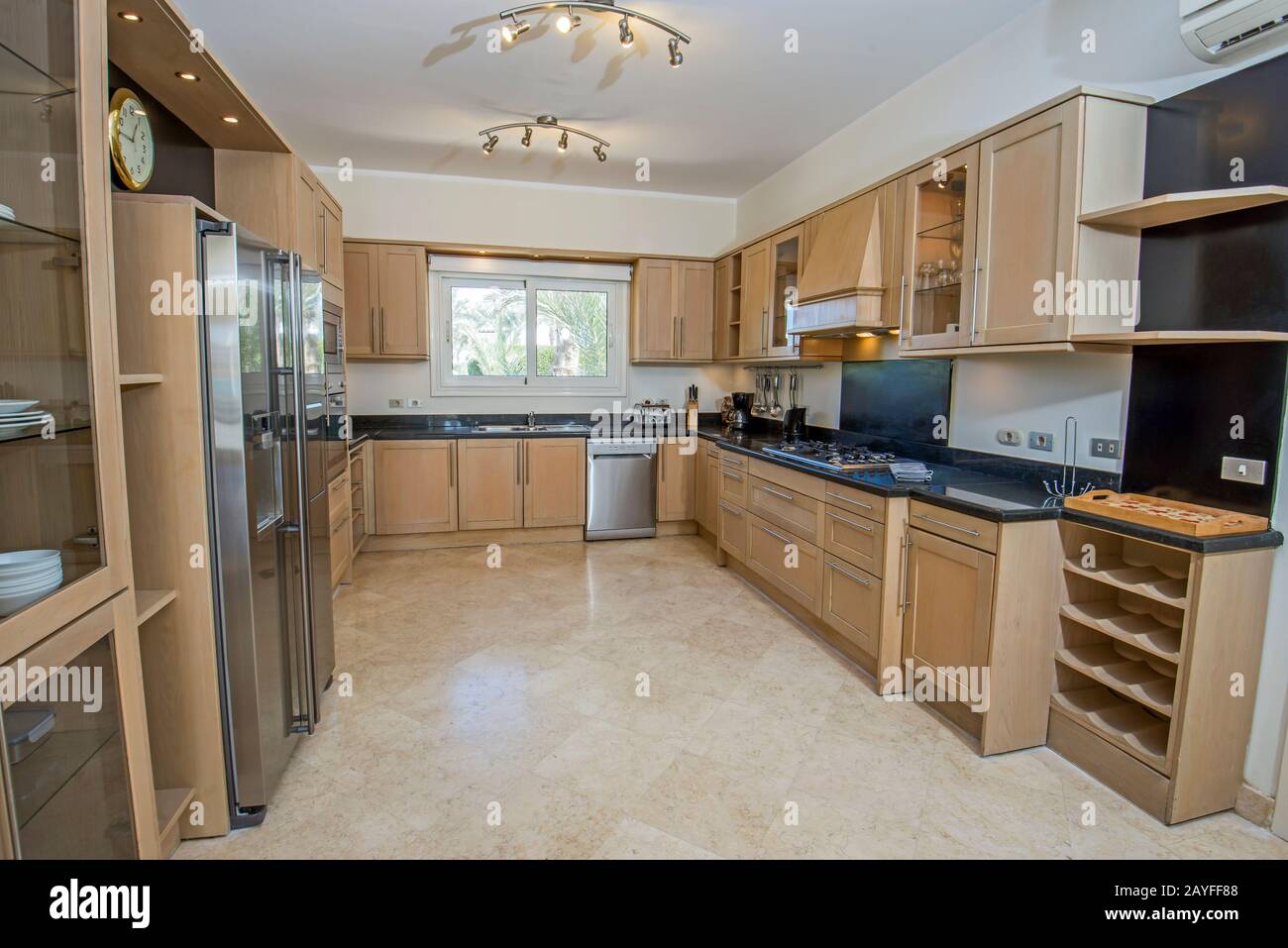 View of Kitchen area in luxury villa show home showing interior design decor ...