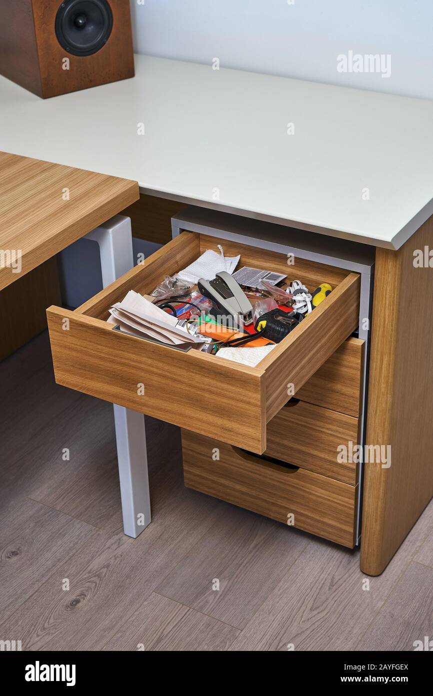 Wooden storage cabinet with open drawer. Wooden office furniture