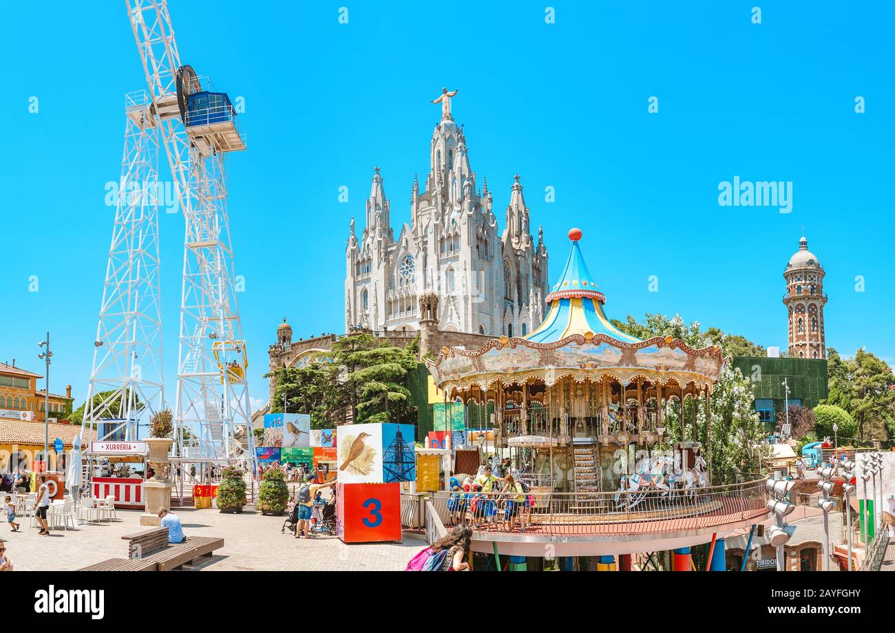 12 JULY 2018, BARCELONA, SPAIN: Amusement Park and Church at Tibidabo hill Stock Photo