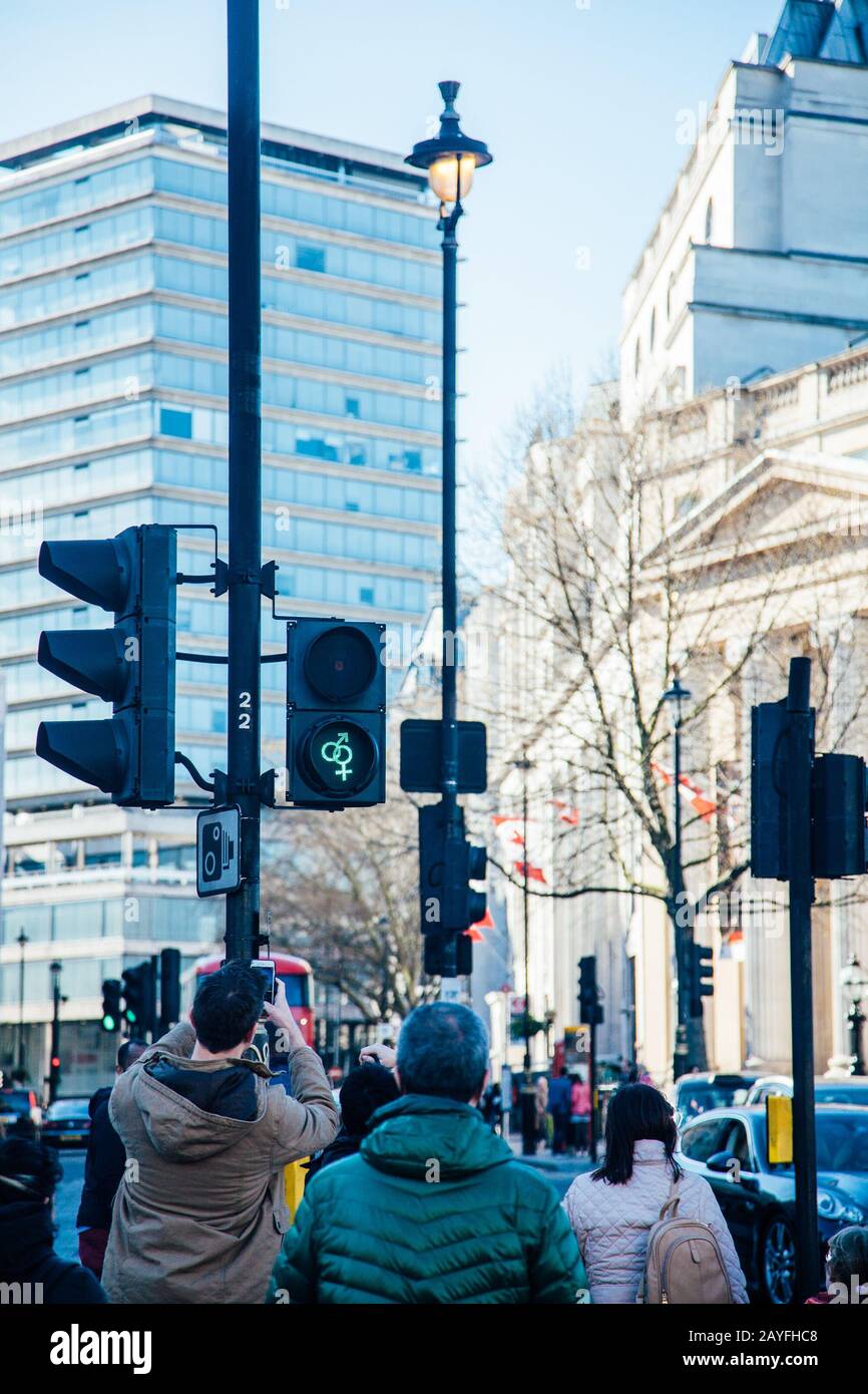 Diversity pedestrian crossing light at Trafalgar Square, London England United Kingdom UK Stock Photo