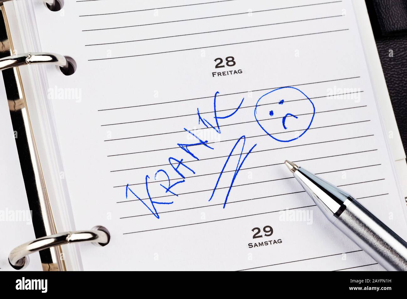 Ein Termin ist in einem Kalender eingetragen:  Krank Stock Photo