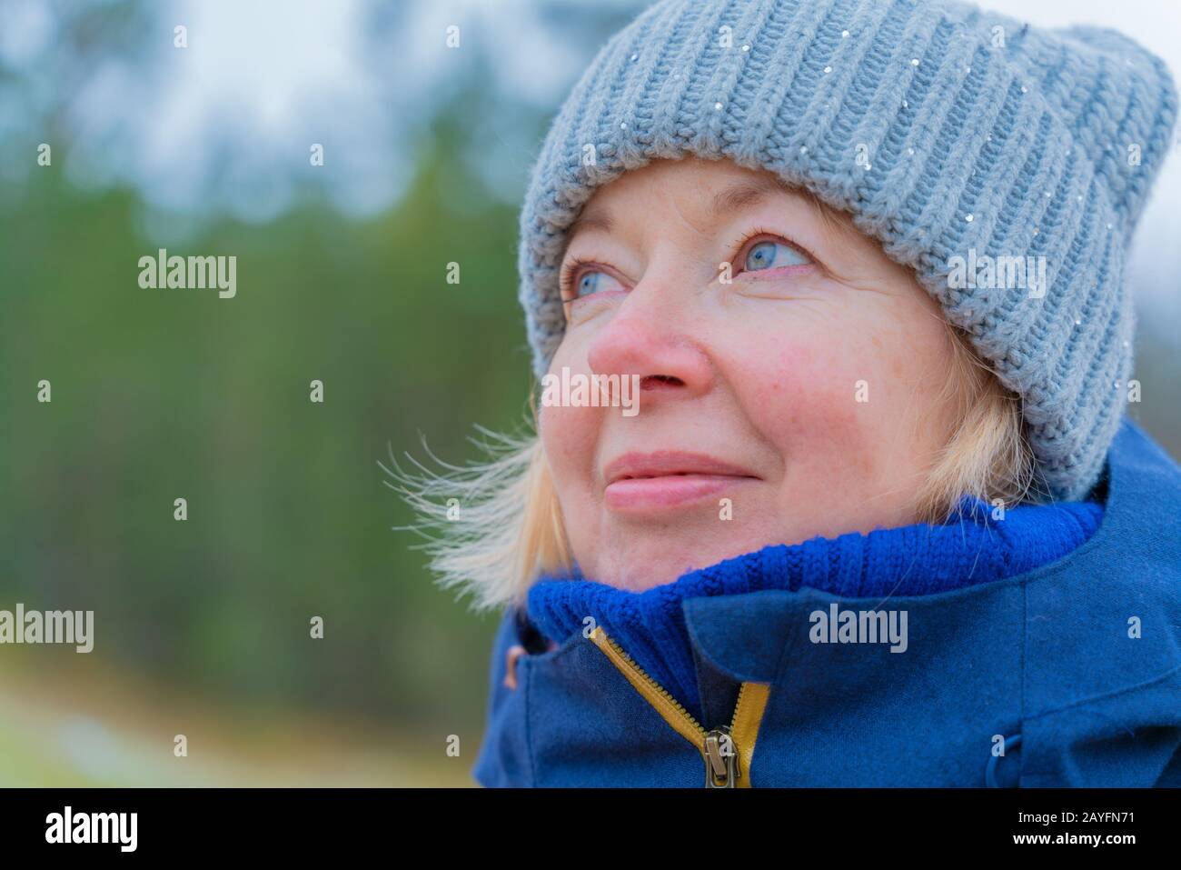 Portrait of happy senior woman. Walk in the park. Spring holidays vacation trip concept. Stock Photo