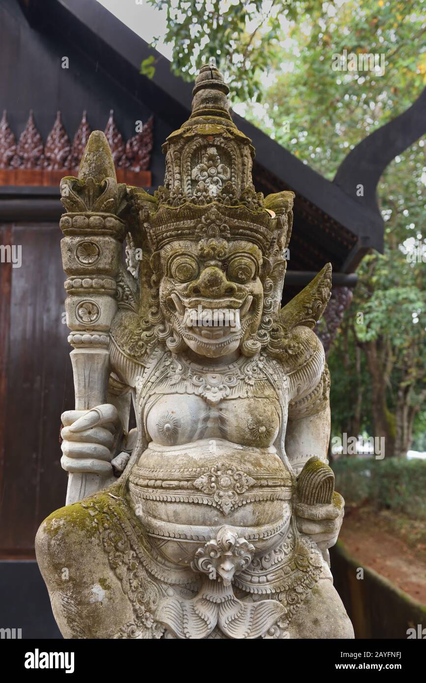 Dvarapala, otherwise known as a dvarpalaka, in the grounds of the Bandaam Museum, Nang Lae, Chiang Rai Province, Thailand Stock Photo