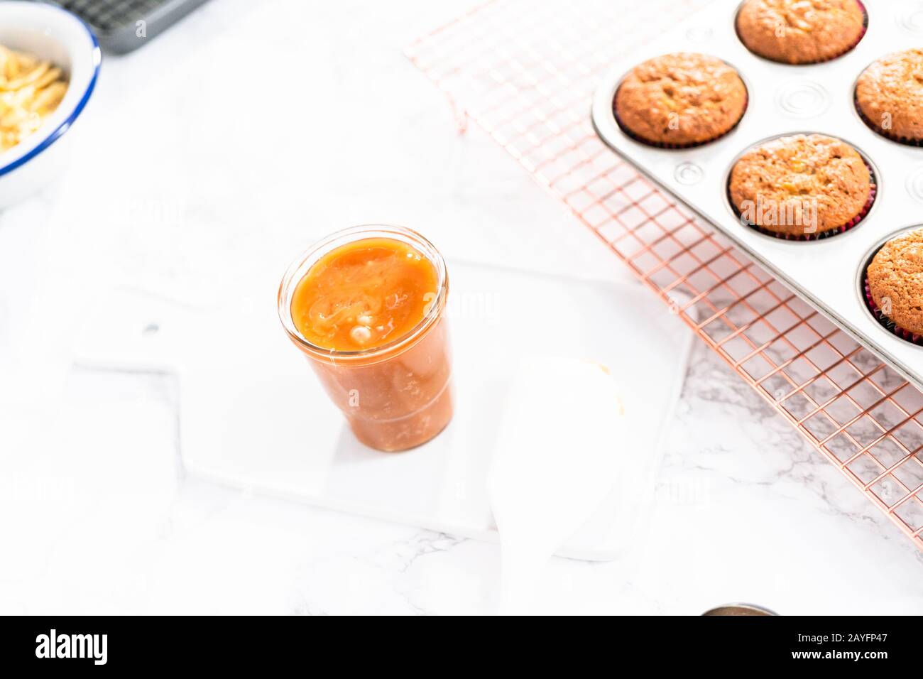 Homemade caramel in a small glass jar Stock Photo - Alamy