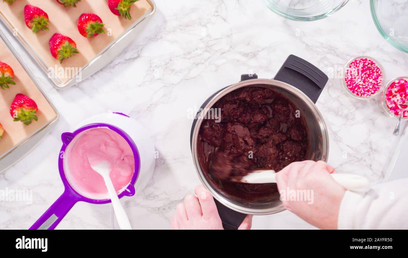 Flat lay. Step by step. Melting chocolate chips in chocolate melting pots Stock Photo Alamy