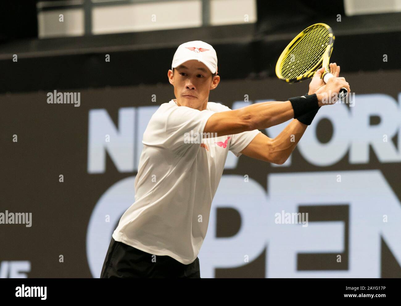 Hempstead, NY - February 14, 2020: Jason Jung of Taipei returns ball during  quaterfinal match against Reilly