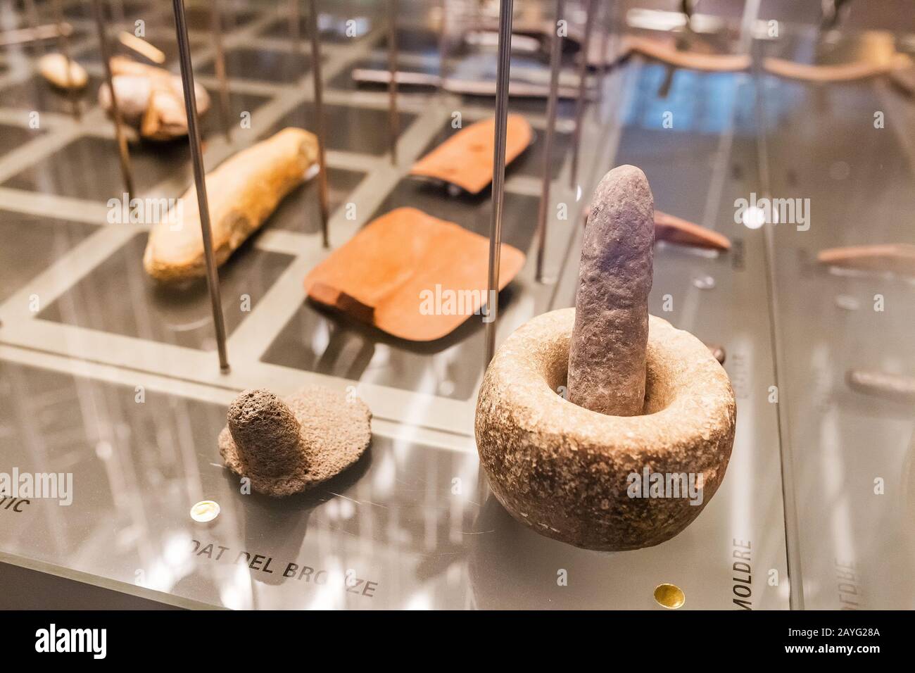 28 JULY 2018, BARCELONA, SPAIN: Ancient stone age tools and mortar, archeology concept Stock Photo