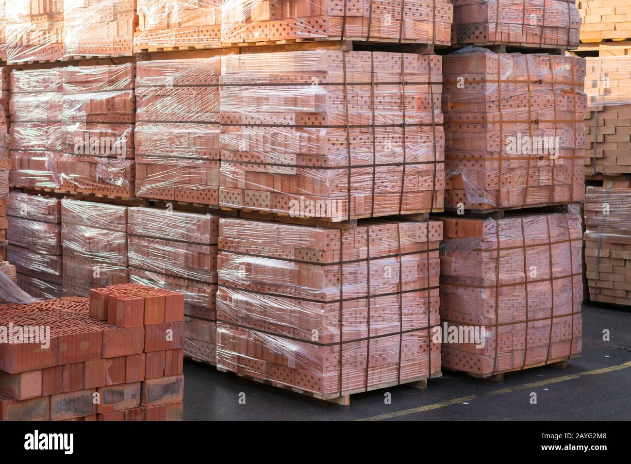 clay brick stored for building construction. Industrial production of