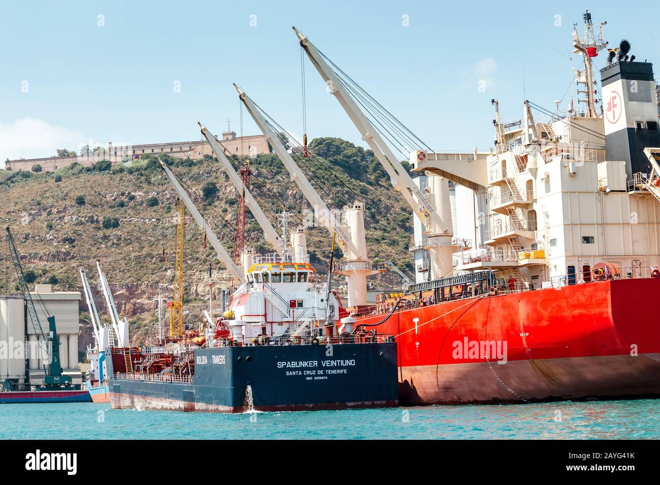 Spanish Container Ship 29 JULY 2018, BARCELONA SPAIN: cargo ship loads containers in the ...