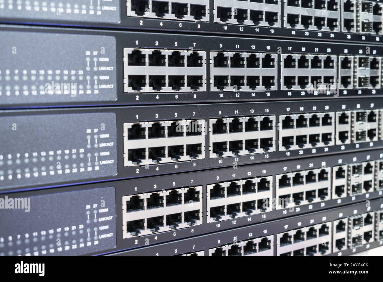 Background image of empty Ethernet switch ports. Server equipment for telecommunications. The concept of connecting to modern Internet technologies Stock Photo