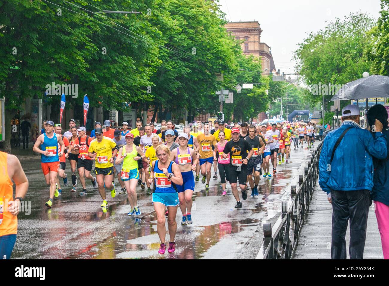 Dnepr, Ukraine - May 20, 2018:Men and women run an amateurish marathon through the streets of the city. Promoting a healthy lifestyle. Stock Photo