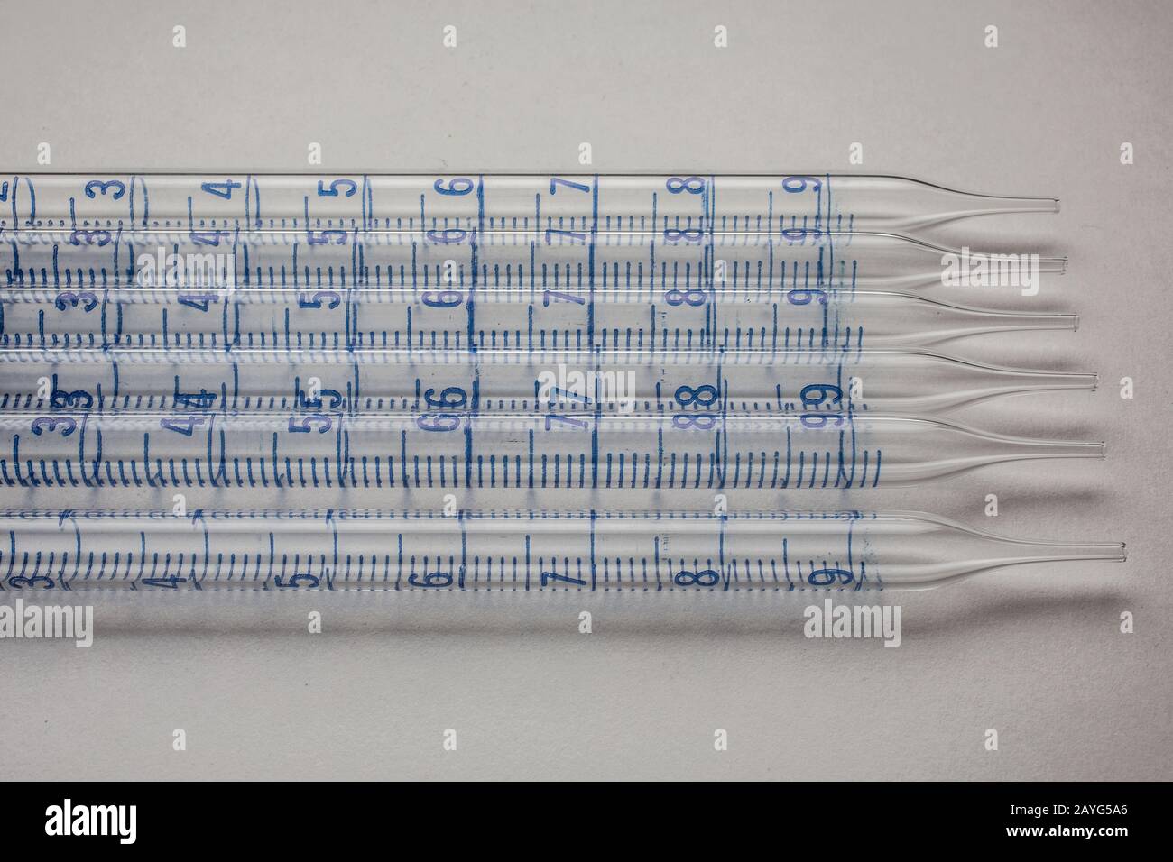 Glass pipettes in the laboratory with scale Stock Photo Alamy