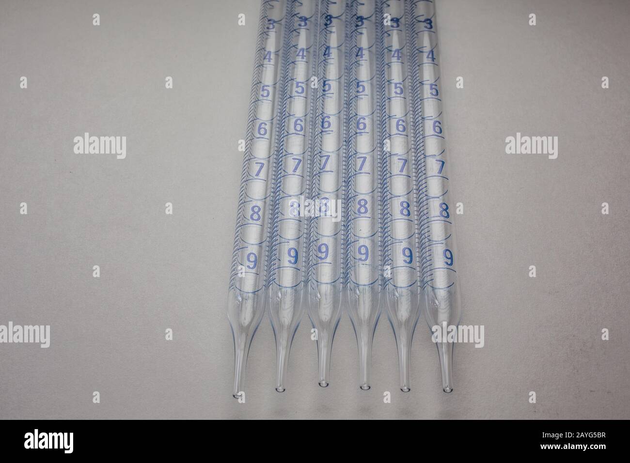 Glass pipettes in the laboratory with scale Stock Photo Alamy