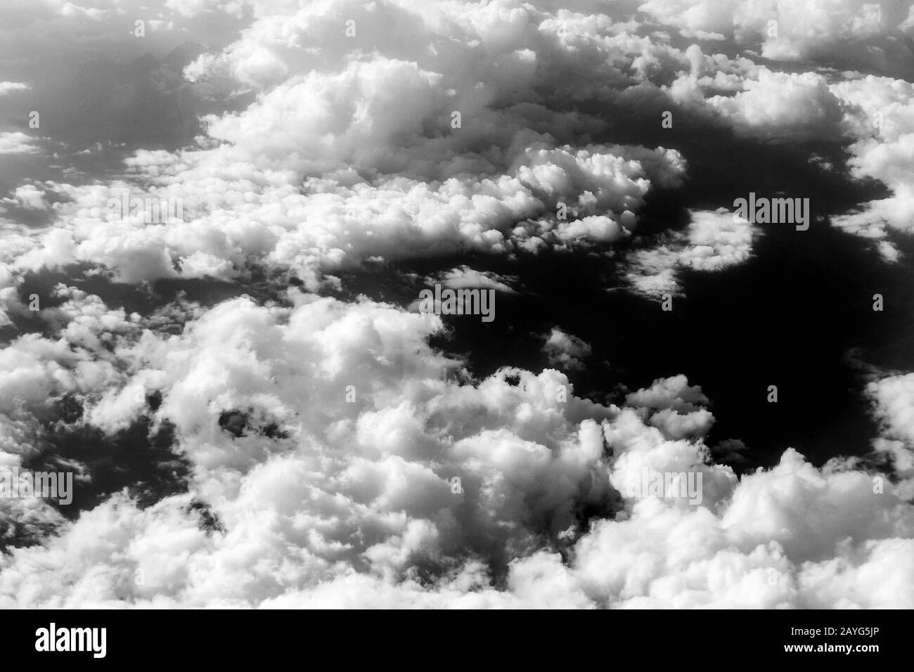 White gray fluffy clouds Black and White Stock Photos & Images - Alamy