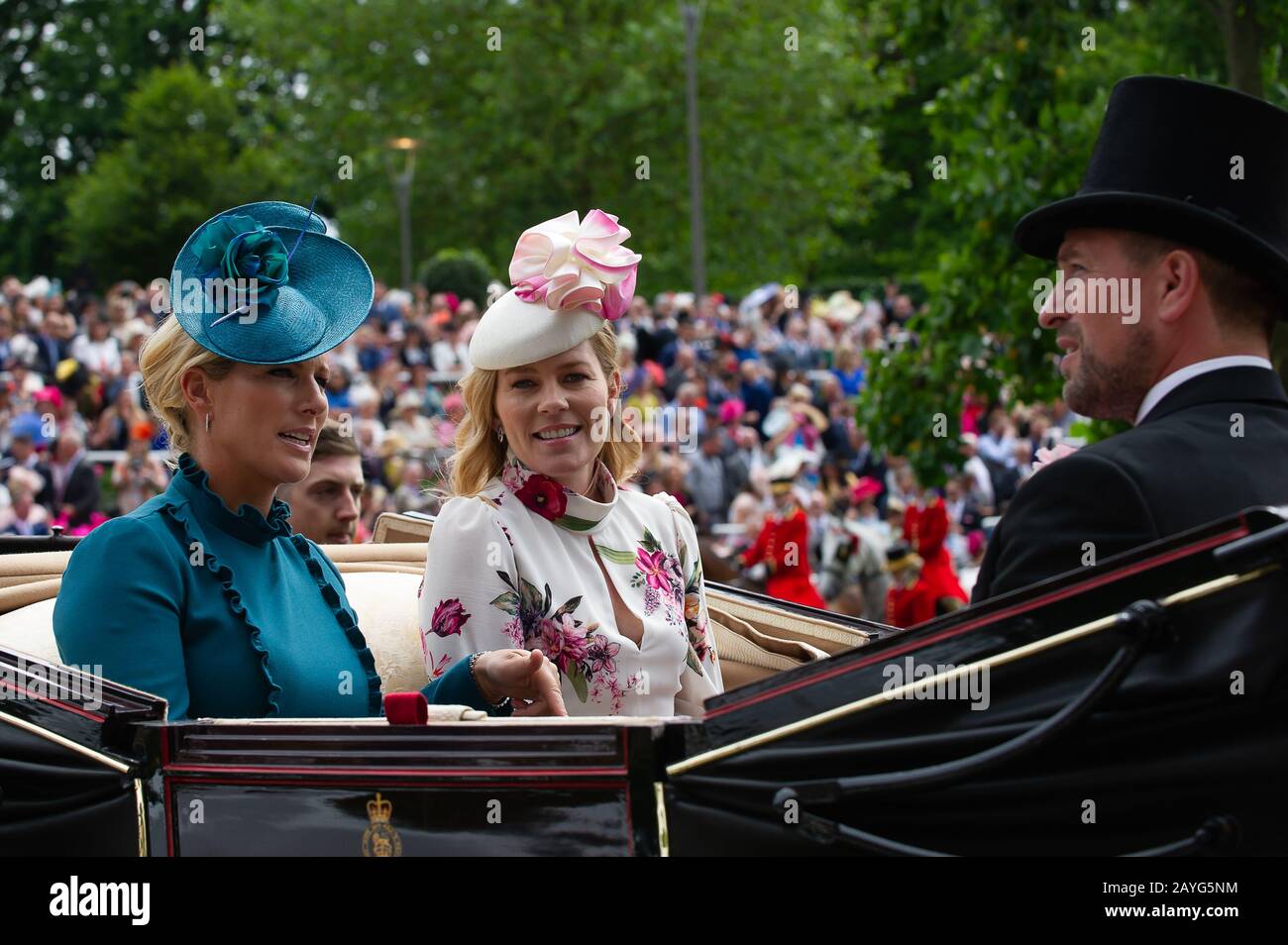 Royal Ascot Ladies Day, Ascot Racecourse, UK. 20th June, 2019. Zara Tindall, Autumn Phillips, Peter Phillps and Mike Tindall arrive in a horse drawn carriage in the  Royal Procession at Royal Ascot. Credit: Maureen McLean/Alamy Stock Photo