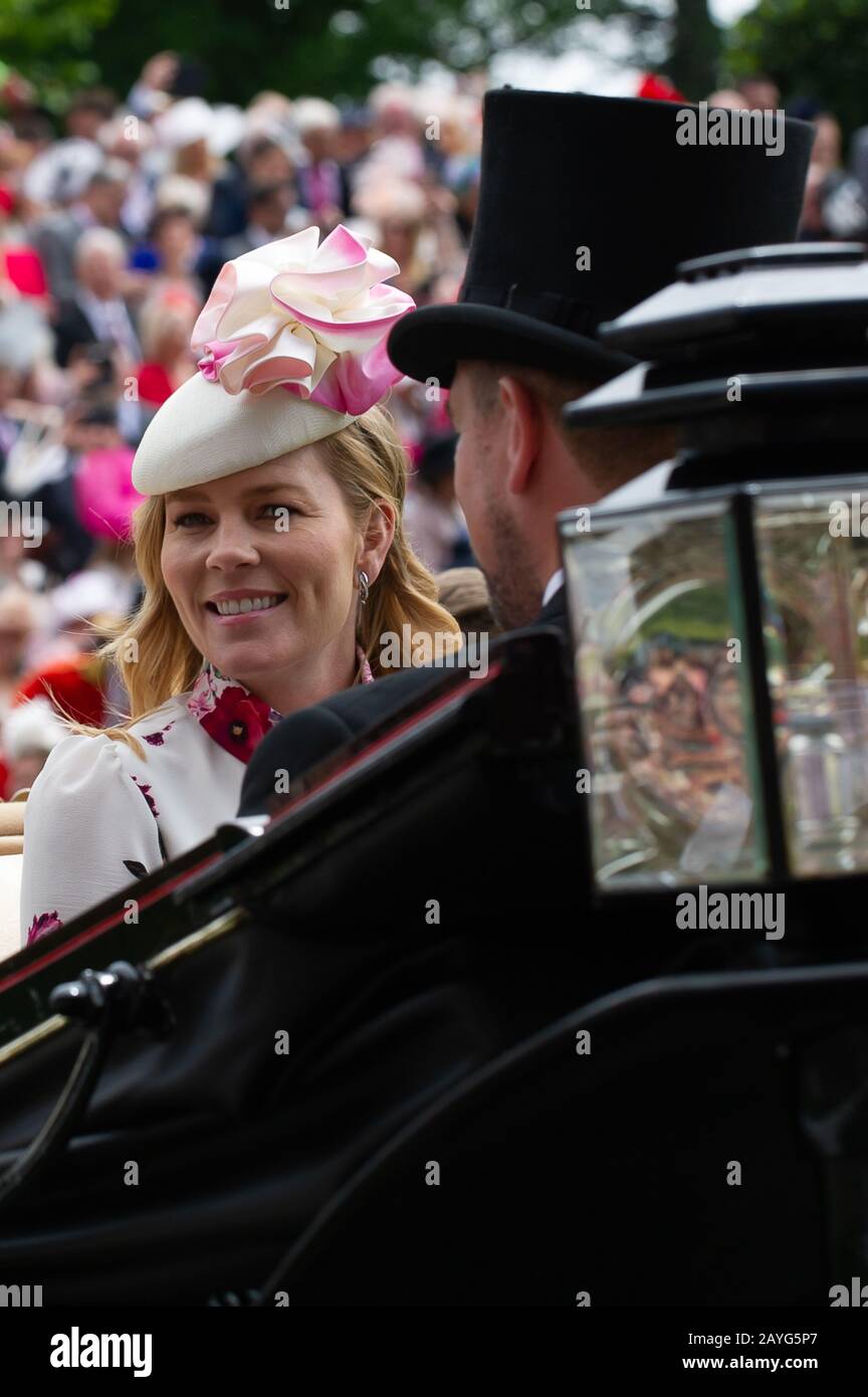 Royal Ascot Ladies Day, Ascot Racecourse, UK. 20th June, 2019. Autumn Phillips arrives in a horse drawn carriage in Royal Procession at Royal Ascot with husband Peter Phillips. Credit: Maureen McLean/Alamy Stock Photo