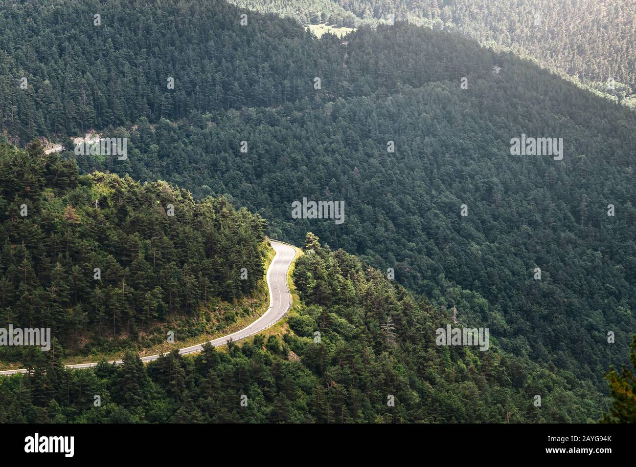 Aerial view of a Winding road from the high mountain pass in Pyrenees ...