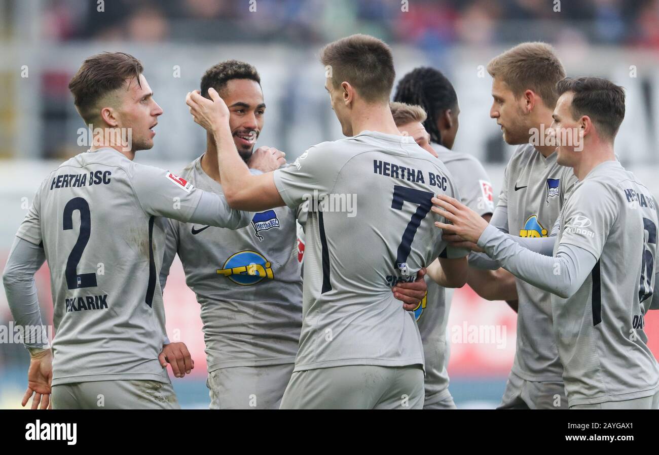 Duesseldorf, Germany. Paderborn, Deutschland. 15th Feb, 2020. 15 February 2020, North Rhine-Westphalia, Paderborn: Football: Bundesliga, SC Paderborn 07 - Hertha BSC Berlin, 22nd matchday in the Benteler Arena. Goal scorer Matheus Cunha (2nd from left) from Berlin celebrates his 1:2 goal with Peter Pekarik (l-r), Krzysztof Piatek, Arne Maier and Vladimir Darida. Photo: Friso Gentsch/dpa - IMPORTANT NOTE: In accordance with the regulations of the DFL Deutsche Fußball Liga and the DFB Deutscher Fußball-Bund, it is prohibited to exploit or have exploited in the stadium and/or from the game taken  Stock Photo
