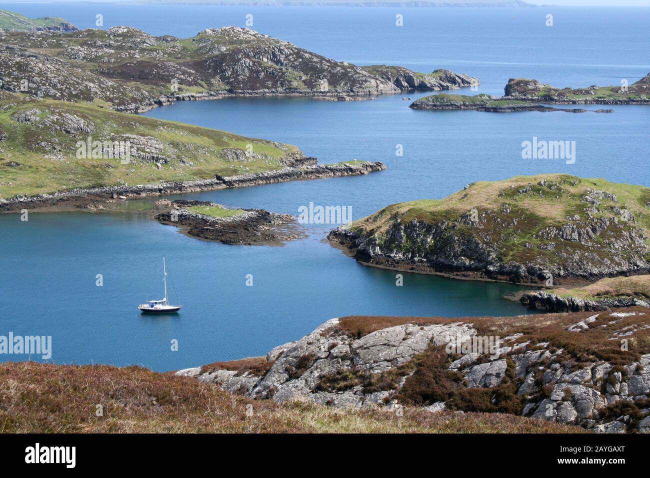 Sailing yacht anchored in the Witches' Pool, Loch Mharabhig, Isle of Lewis, Western Isles, Scotland Stock Photo
