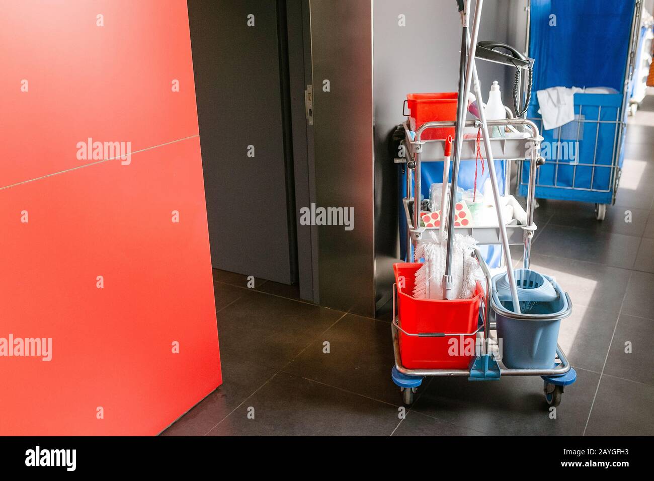 Cleaning equipment cart in hotel Stock Photo Alamy