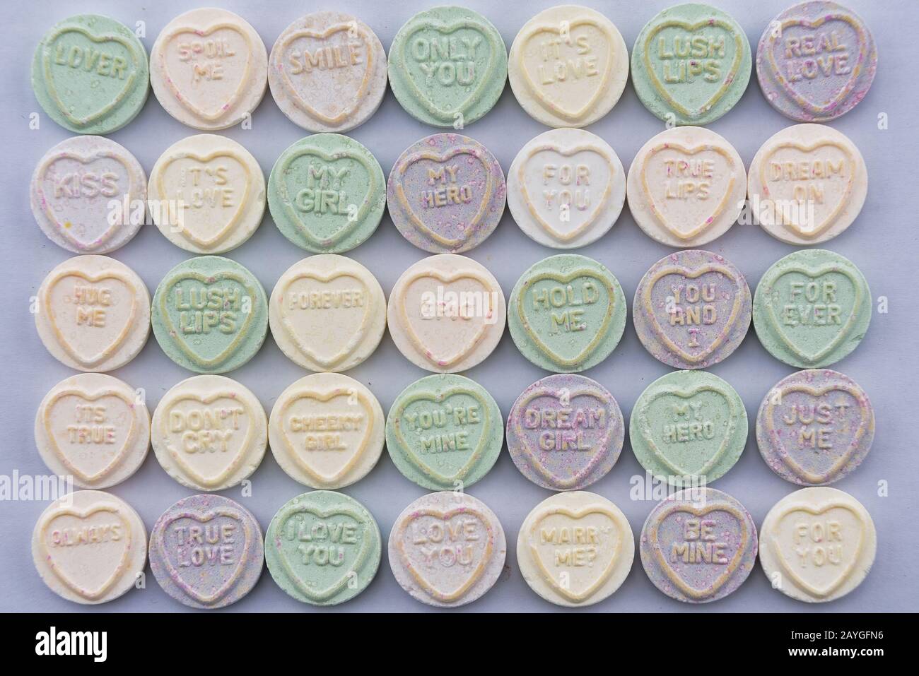 Sugar hard candy sweets which have love messages on them Stock Photo ...