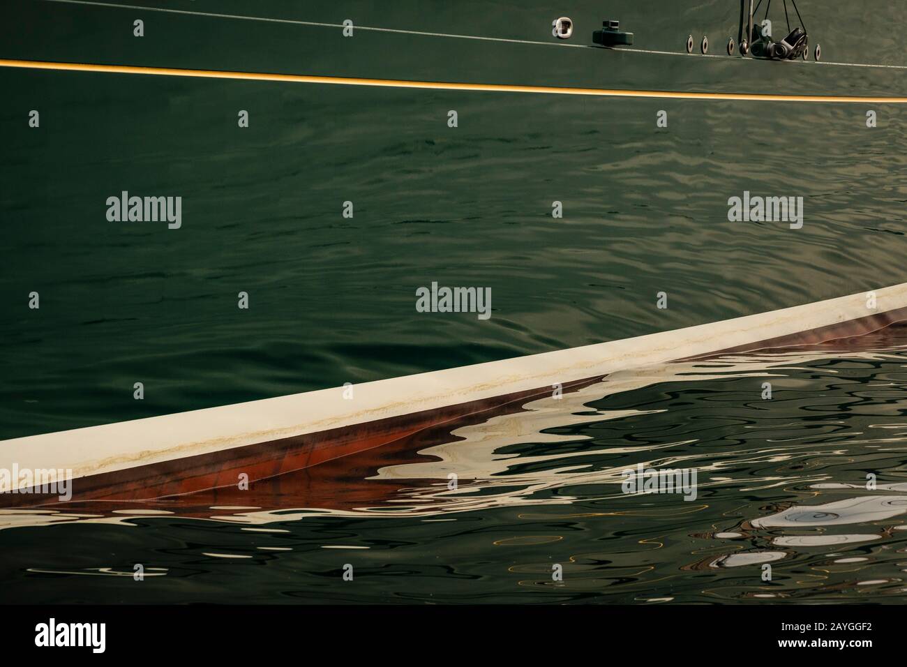 Reflections on the mirror surface on the hull of the large greenhulled