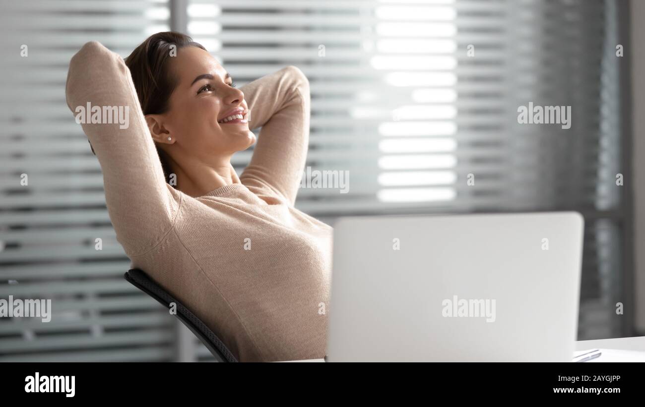 Woman Leaning Back In Chair High Resolution Stock Photography and ...
