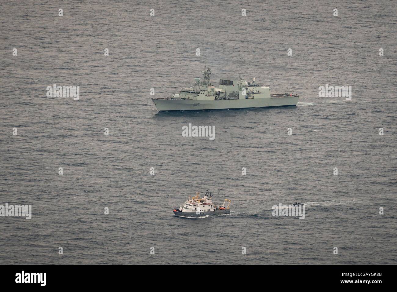 Aerial view of Halifaxclass frigate HMCS FREDERICTON carrying out a