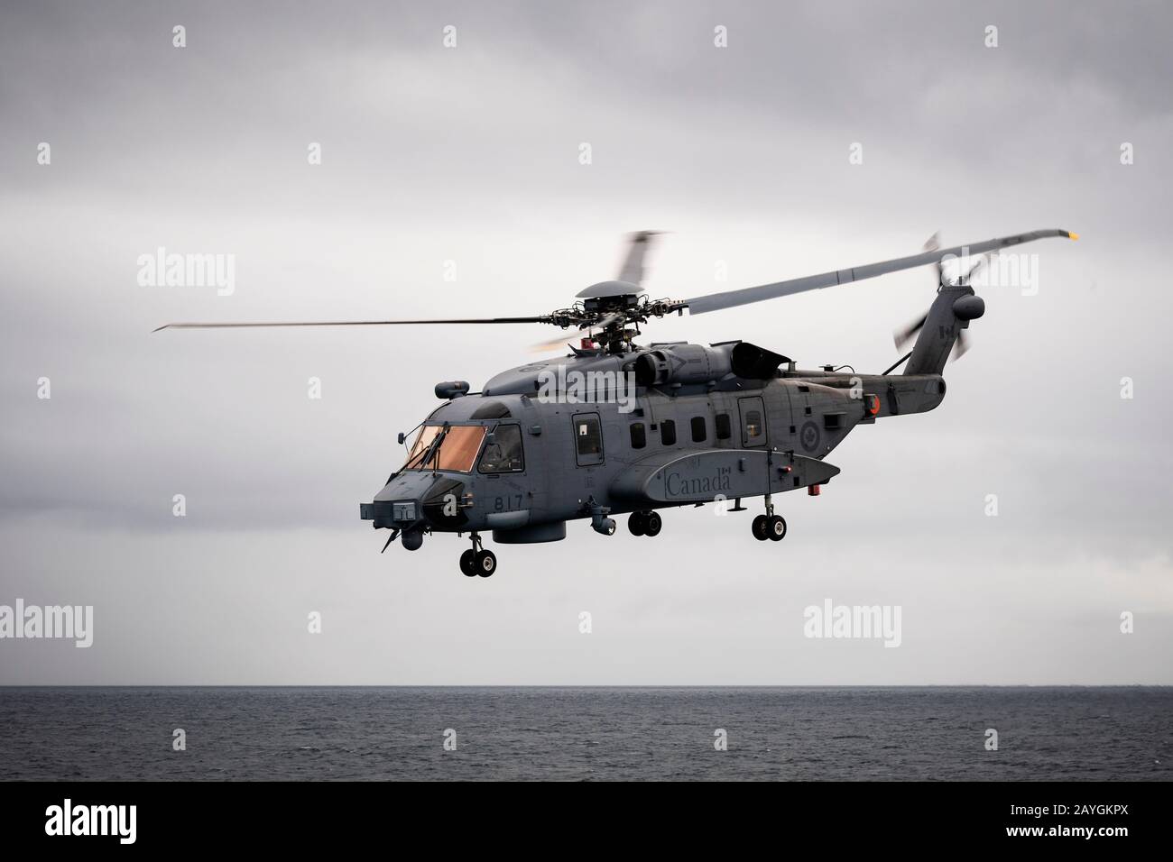 While operating at sea, a Royal Canadian Air Force CH-148 Cyclone helicopter takes off from HMCS VILLE DE QUEBEC during Exercise Cutlass Fury. Stock Photo