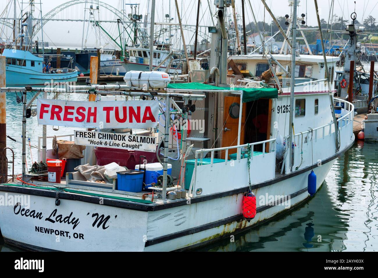 Newport,Oregon,USA - August 23,2015: A fisherman sells his catch from his boat in the marina at Yaquina Bay, in Newport, on the Oregon Coast Stock Photo