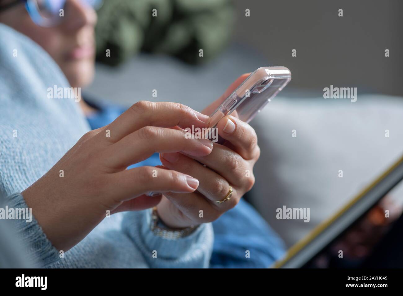 Woman  holds smart phone-close-up Stock Photo