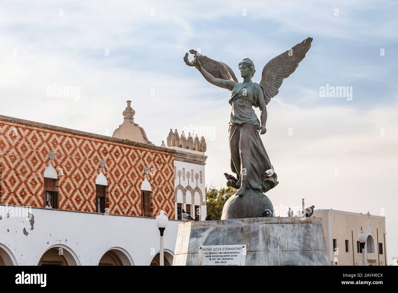 27 May 2019, Rhodes, Greece: Angel statue of victory in Mandraki harbor in  old town of Rodos Stock Photo - Alamy
