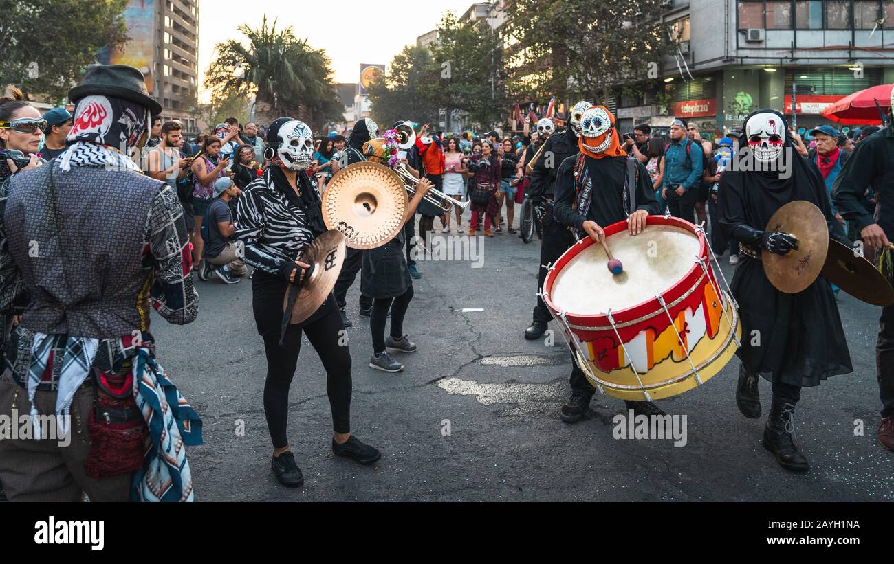 Peaceful protesters performing on the streets around Plaza de Italia during recent demonstrations against inequality in Santiago de Chile. Stock Photo