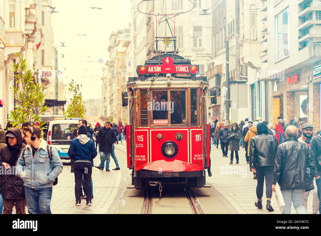 ISTANBUL - JAN 01: Famous retro red Tram on on Taksim Square and Istiklal Street in Istanbul on January 01. 2020 in Turkey Stock Photo
