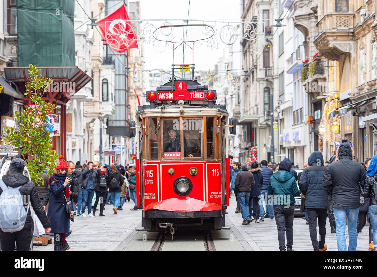 ISTANBUL - JAN 01: Famous retro red Tram on on Taksim Square and Istiklal Street in Istanbul on January 01. 2020 in Turkey Stock Photo