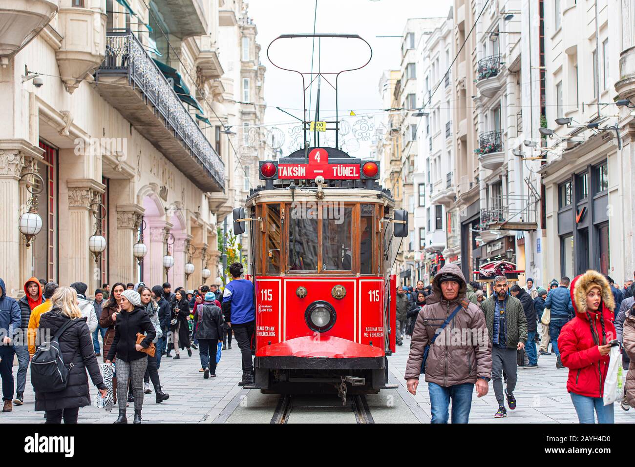 ISTANBUL - JAN 01: Famous retro red Tram on on Taksim Square and Istiklal Street in Istanbul on January 01. 2020 in Turkey Stock Photo