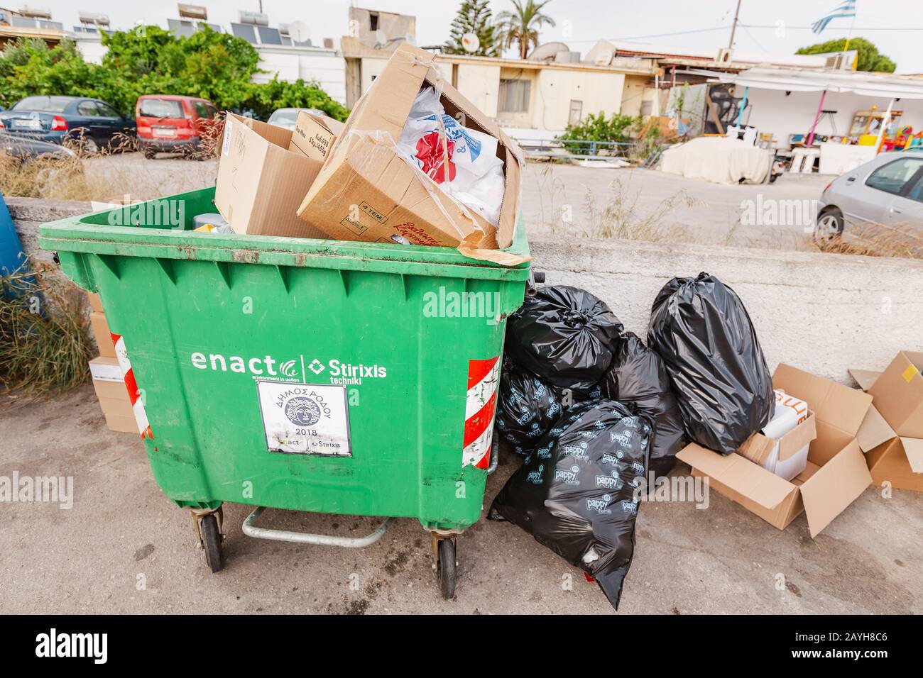 28 May 2019, Rhodes, Greece Garbage container full of trash and