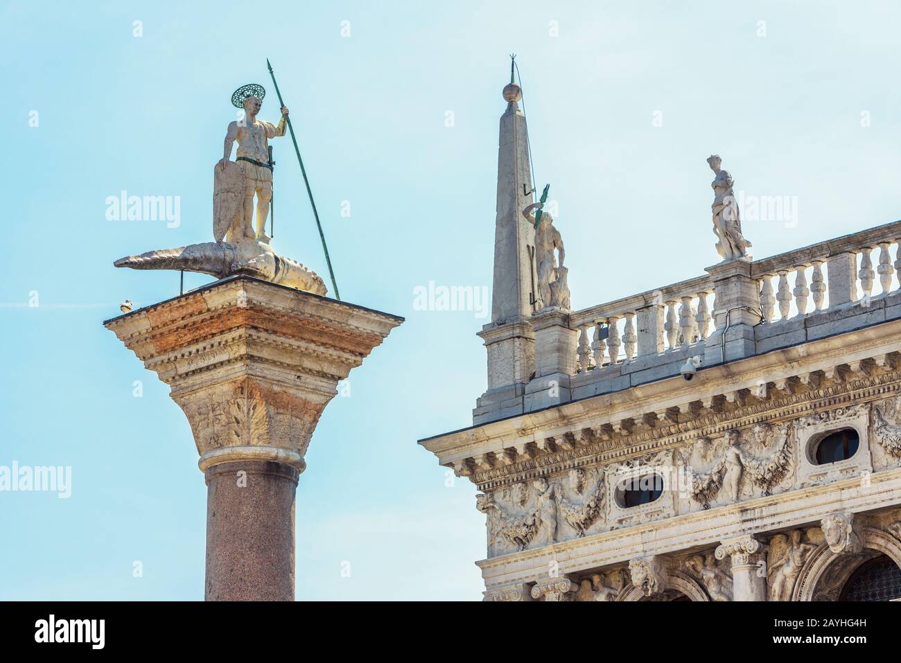 An ancient column with a statue of St Theodore on the Piazza San Marco ...
