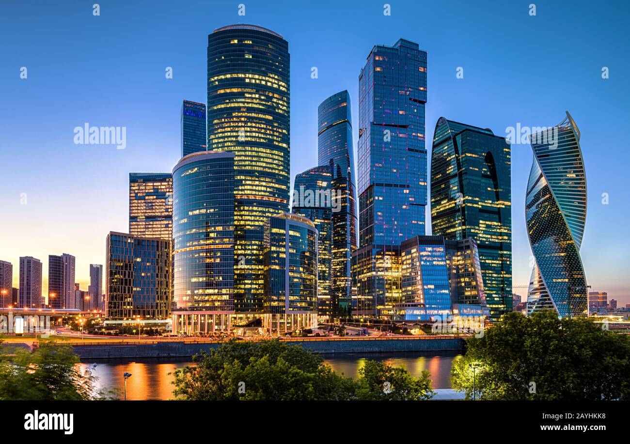Moscow-City at night, Russia. Moscow-City is a business district at Moskva River. Evening view of commercial and residential skyscrapers. Panorama of Stock Photo