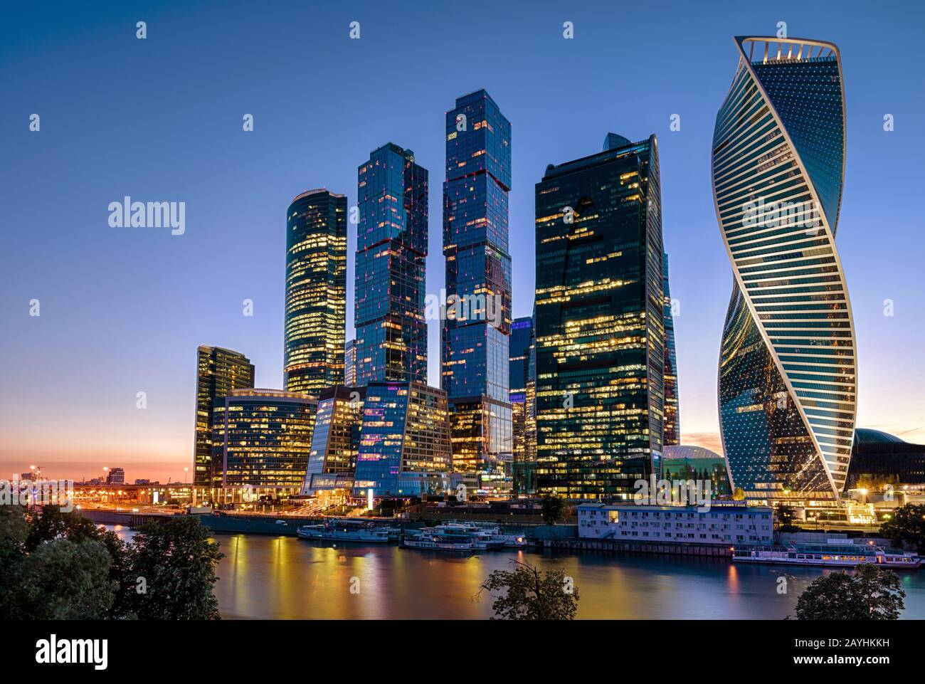 Moscow-City skyscrapers at Moskva River at night, Russia. It is a new district in the Moscow center. Evening view of office and residential tall build Stock Photo