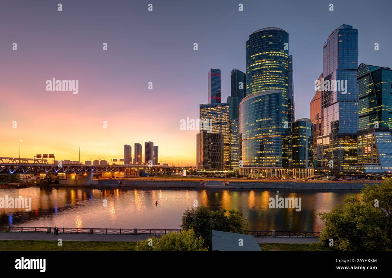 Panorama of Moscow with tall buildings of Moscow-City at night, Russia. Moscow-City is a new district at Moskva River. Scenic view of modern Moscow at Stock Photo