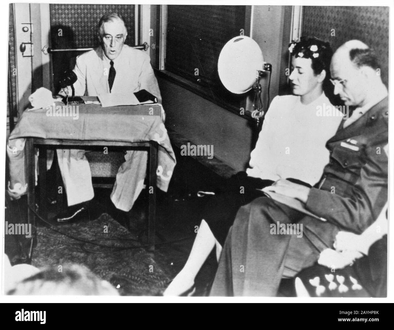 Franklin D. Roosevelt accepts nomination by DNC at Chicago from train at San Diego, California with Mr. & Mrs. James Roosevelt. July 20, 1944. Stock Photo