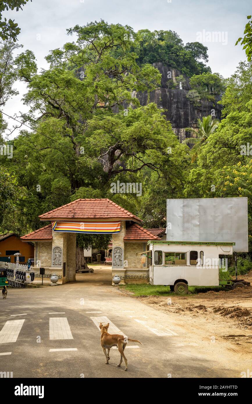 Entrance to the ancient Buddhist rock temple in Mulkirigala, Sri Lanka. Old religious architecture and landscape of Sri Lanka. Best travel destination Stock Photo
